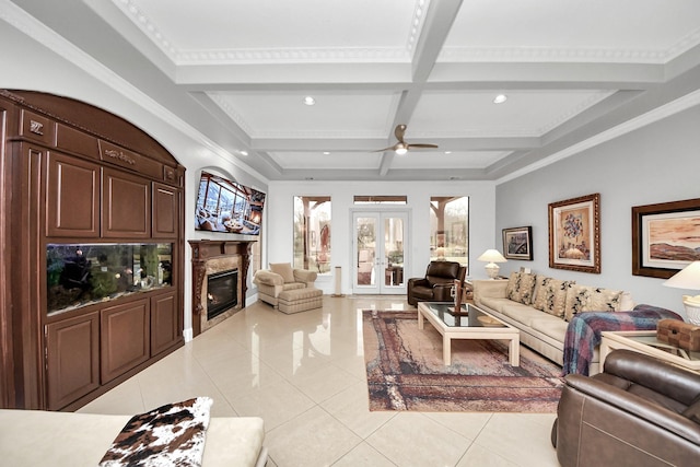 living room with french doors, a high end fireplace, light tile patterned floors, coffered ceiling, and beamed ceiling