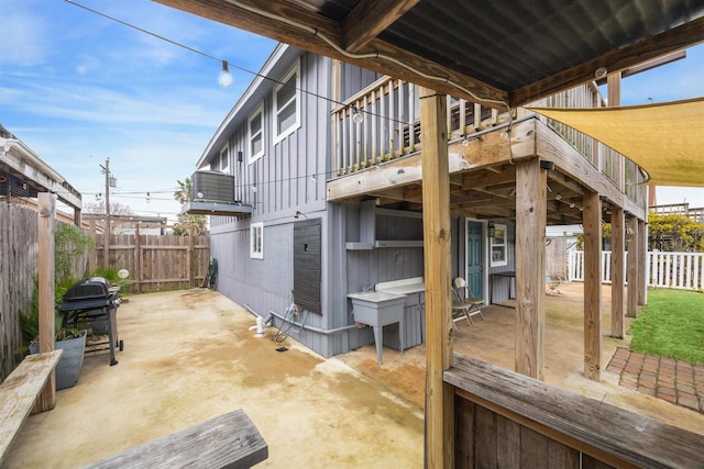 view of patio featuring area for grilling and fence private yard