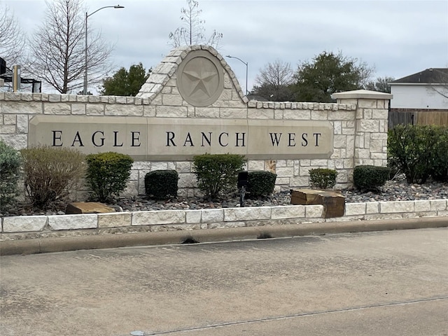 view of community sign