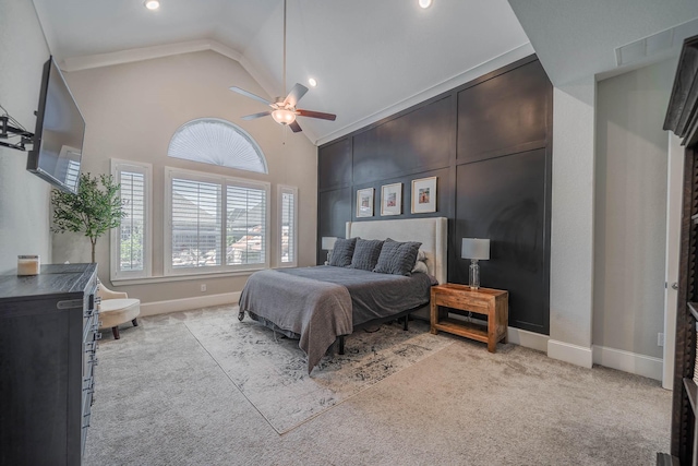 bedroom with ceiling fan, high vaulted ceiling, carpet, and baseboards