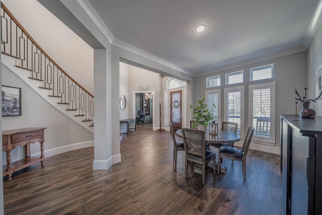 dining area featuring stairs, baseboards, dark wood finished floors, and crown molding