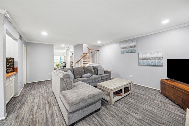 2592 Bering, Houston, TX 77057 - living area with stairway, wood finished floors, recessed lighting, crown molding, and baseboards