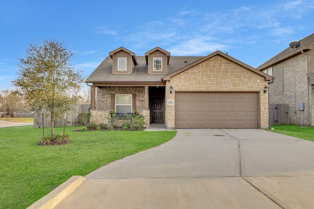 view of front of house featuring a front yard and a garage