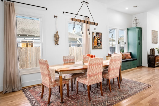 dining room featuring recessed lighting, visible vents, baseboards, and light wood finished floors