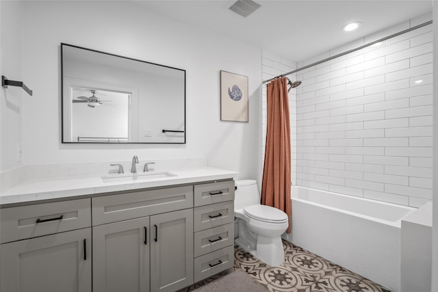 full bath featuring visible vents, toilet, shower / tub combo, vanity, and a ceiling fan