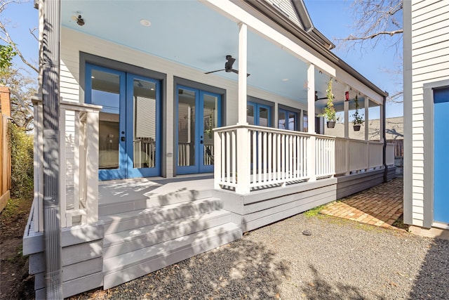 exterior space featuring french doors and a ceiling fan