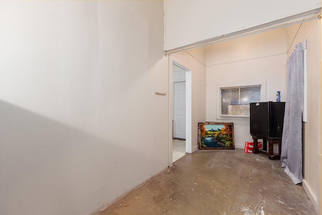 living room featuring concrete floors