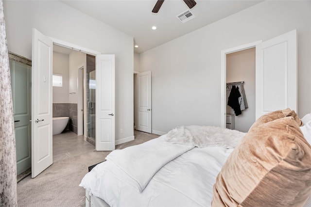 108 Knightsbridge Park Ln, Houston, TX 77018 - carpeted bedroom with tile walls, connected bathroom, and ceiling fan