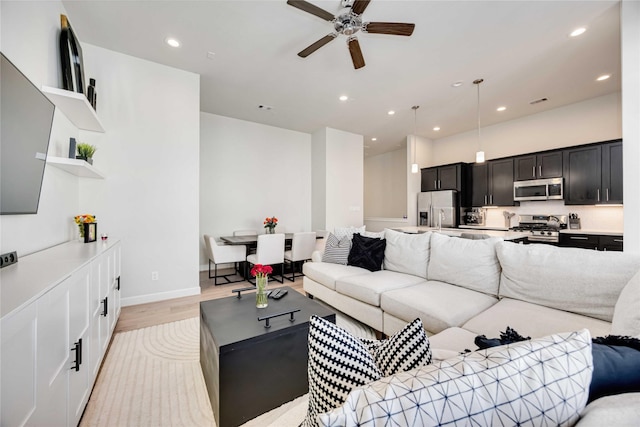 108 Knightsbridge Park Ln, Houston, TX 77018 - living room with ceiling fan and light hardwood / wood-style floors