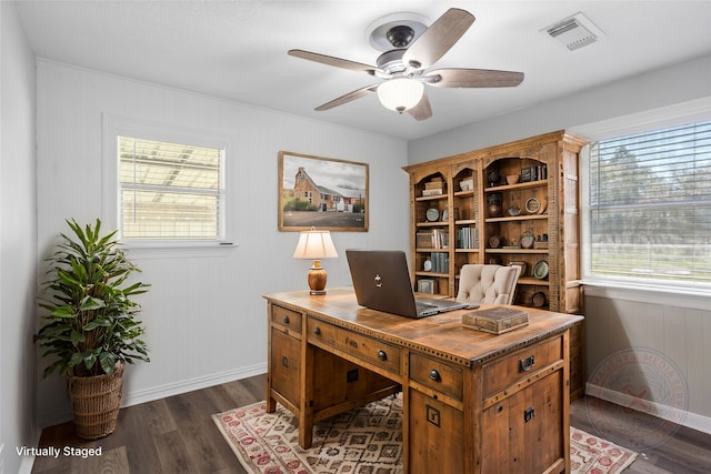 office area with baseboards, visible vents, dark wood-style flooring, and ceiling fan