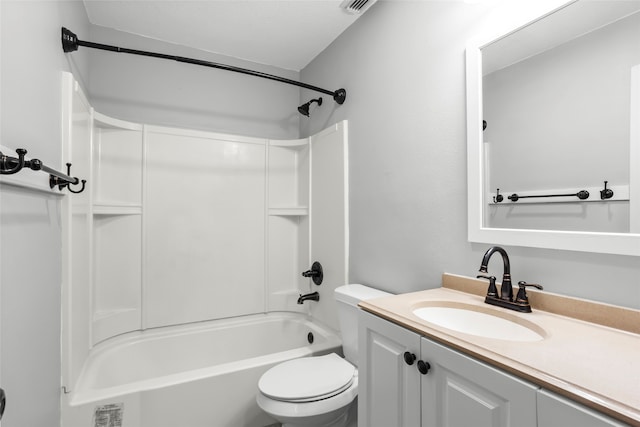 bathroom featuring tub / shower combination, toilet, and vanity