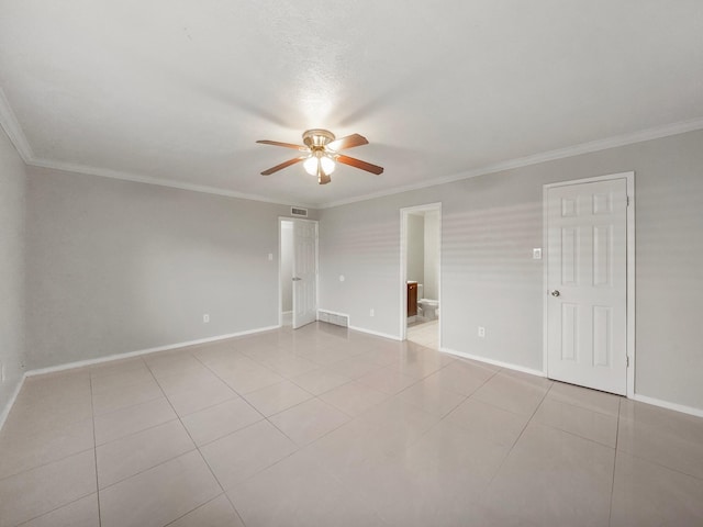 unfurnished room with light tile patterned flooring, ceiling fan, and ornamental molding