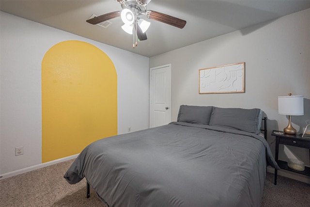 bedroom with ceiling fan and carpet flooring