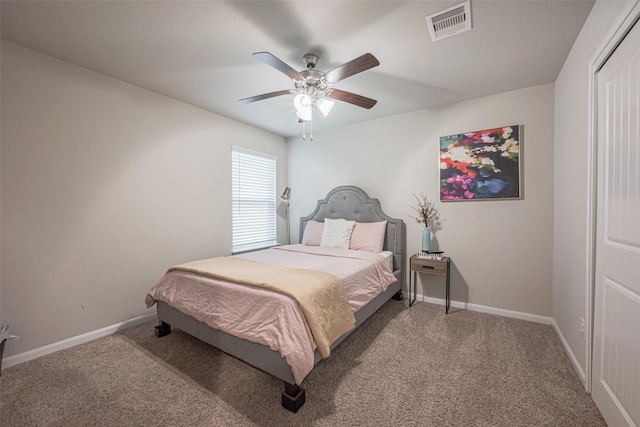 carpeted bedroom featuring ceiling fan