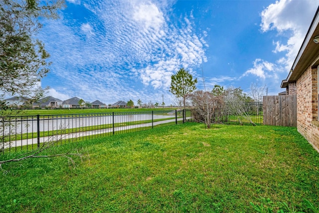 view of yard with a water view