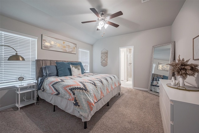 carpeted bedroom with vaulted ceiling and ceiling fan