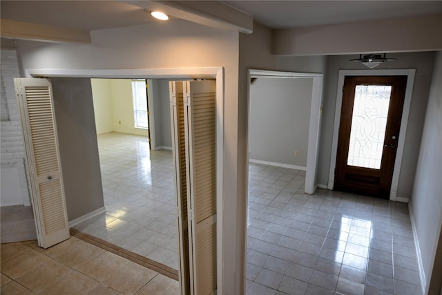 entrance foyer with light tile patterned flooring
