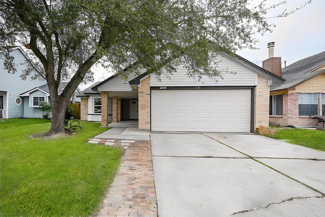 view of front of house with a front lawn and a garage