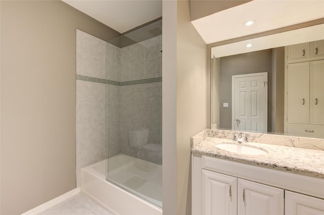 bathroom with tile patterned floors, vanity, and bath / shower combo with glass door