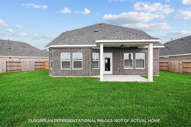 back of house with a yard, a patio, and ceiling fan