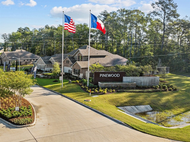 view of community featuring a lawn