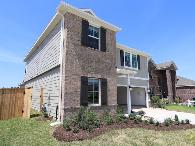 22435 Birchfield Grove Ln, New Caney, TX 77357 - traditional-style home with driveway, a garage, and board and batten siding