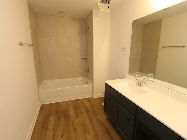 22435 Birchfield Grove Ln, New Caney, TX 77357 - bathroom with wood finished floors, vanity, and shower / bathtub combination