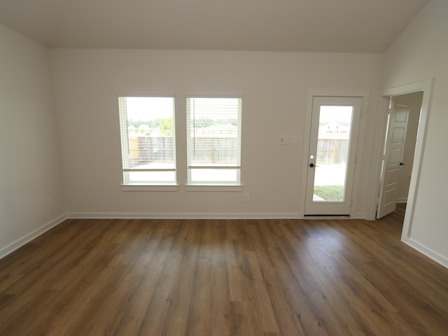 22435 Birchfield Grove Ln, New Caney, TX 77357 - entrance foyer with dark wood-style floors and baseboards