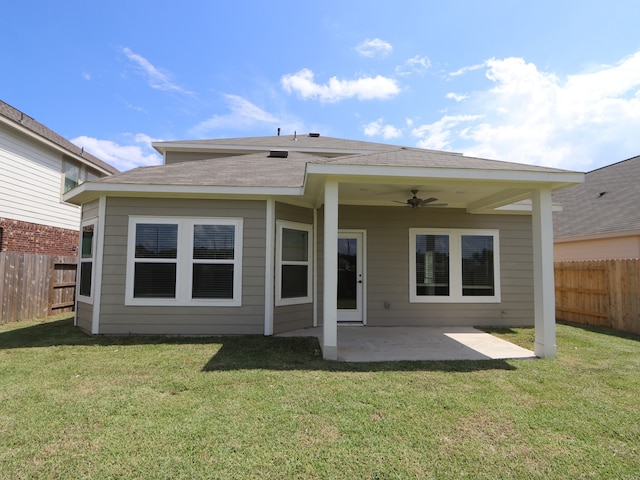 22435 Birchfield Grove Ln, New Caney, TX 77357 - rear view of property with a ceiling fan, a fenced backyard, a patio, and roof with shingles