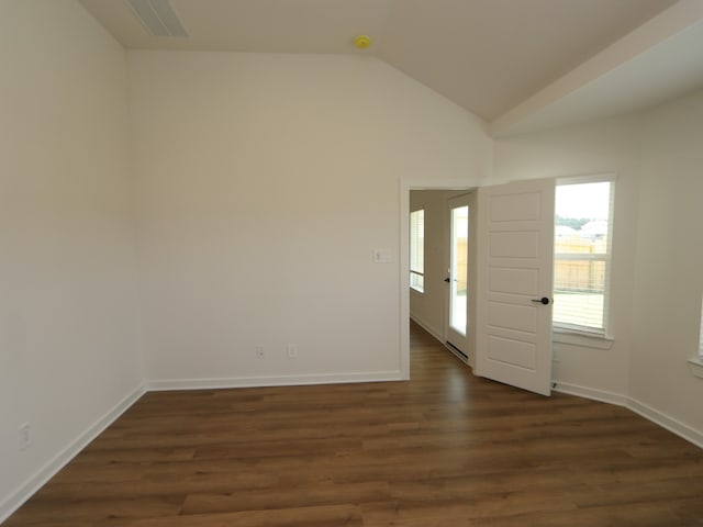 22435 Birchfield Grove Ln, New Caney, TX 77357 - empty room featuring lofted ceiling and dark wood-style floors