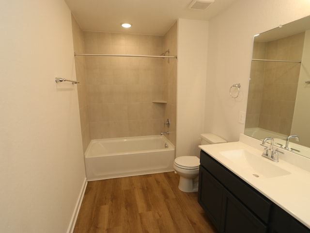 22435 Birchfield Grove Ln, New Caney, TX 77357 - full bath with wood finished floors, vanity, and shower / bath combination