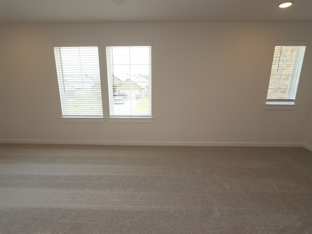 22435 Birchfield Grove Ln, New Caney, TX 77357 - carpeted empty room featuring baseboards and recessed lighting