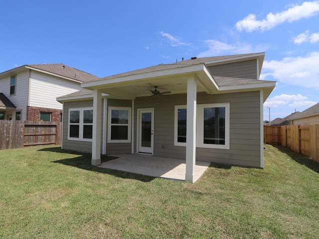 22435 Birchfield Grove Ln, New Caney, TX 77357 - back of property featuring a ceiling fan, a fenced backyard, and a patio area