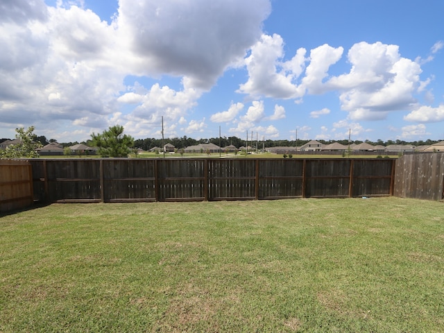 22435 Birchfield Grove Ln, New Caney, TX 77357 - fenced backyard featuring a residential view