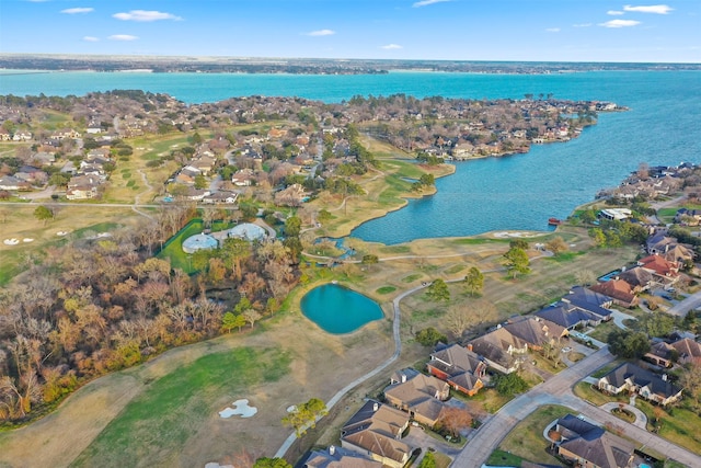 aerial view featuring a residential view and a water view