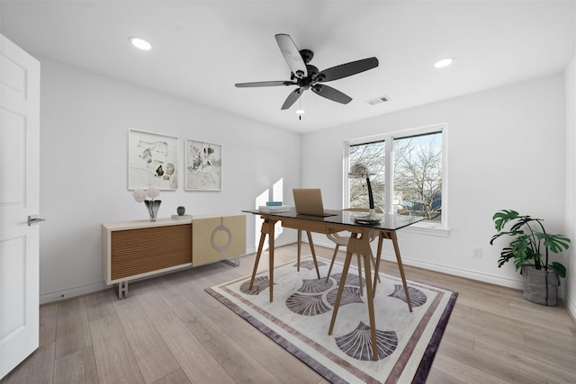 office area featuring light wood-type flooring, baseboards, and recessed lighting