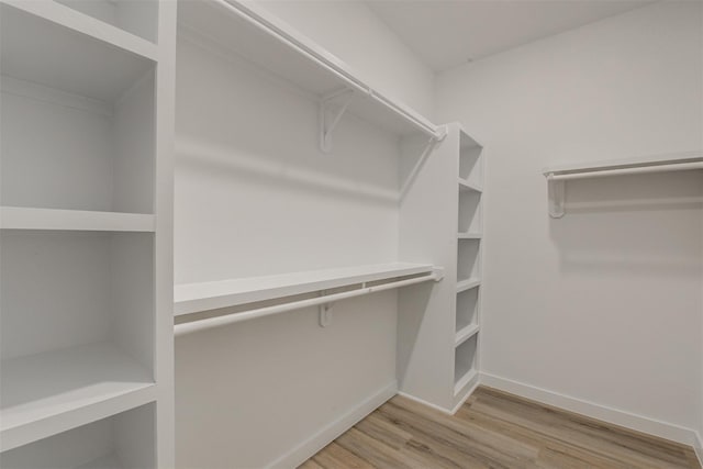 walk in closet featuring light wood-type flooring