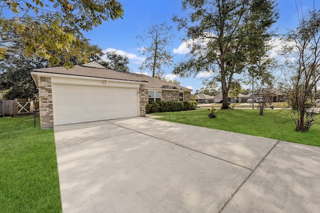 exterior space featuring a garage and a front yard