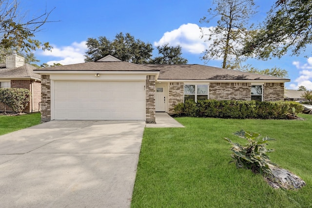 single story home featuring a garage and a front lawn