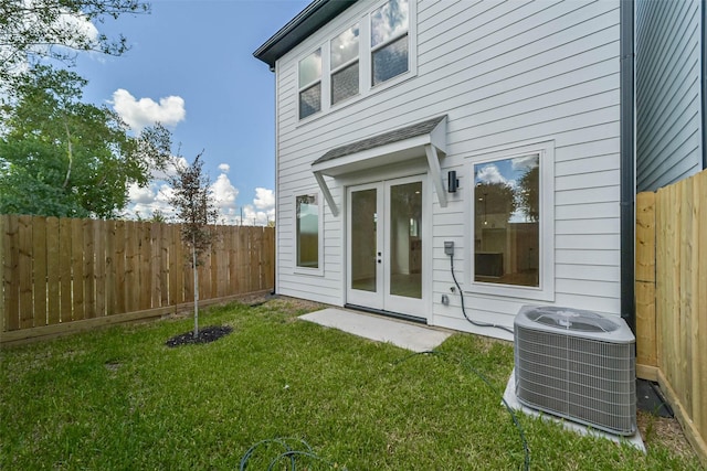 4430 Edmund St, Houston, TX 77020 - back of property with cooling unit and french doors