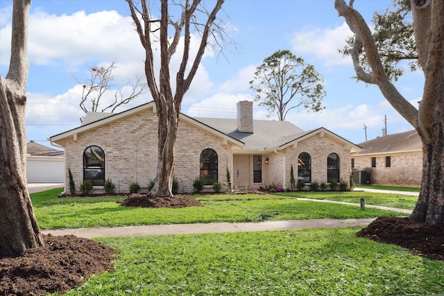 ranch-style house with a front yard