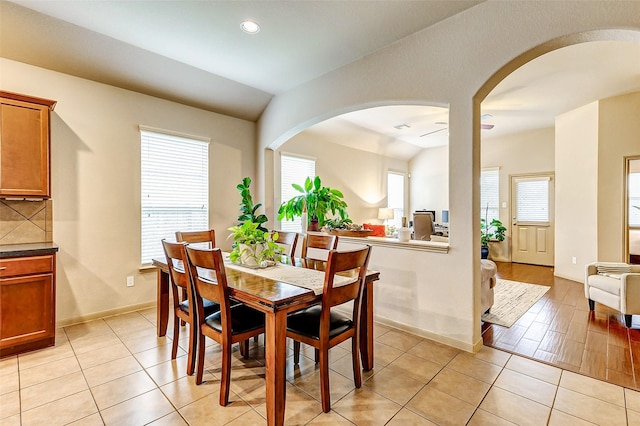 dining area featuring light tile patterned flooring