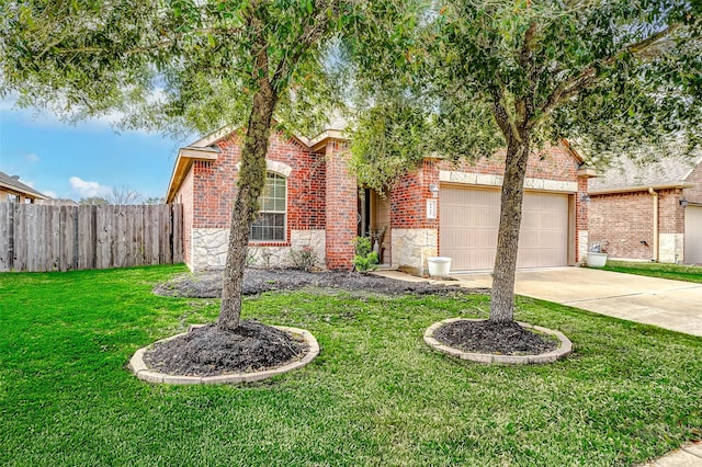 view of front of home featuring a front lawn and a garage