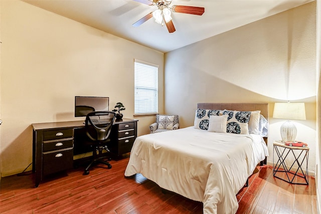 bedroom featuring ceiling fan and wood-type flooring