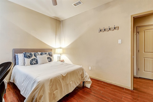 bedroom featuring hardwood / wood-style flooring and ceiling fan