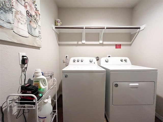 laundry room featuring washer and clothes dryer