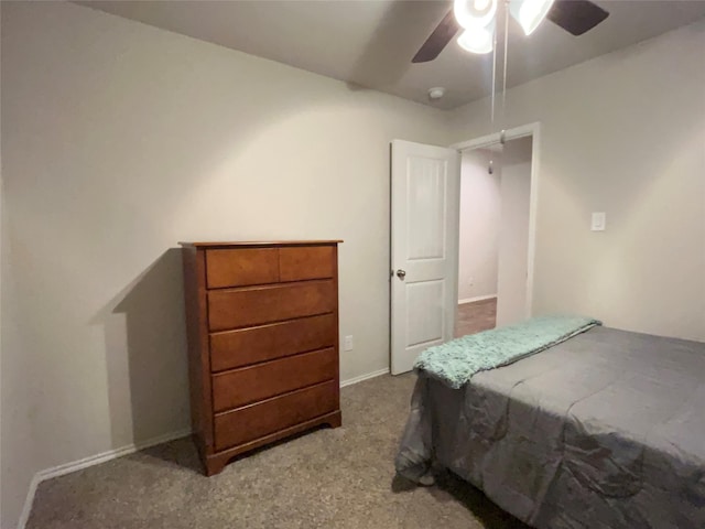 bedroom featuring ceiling fan and carpet floors