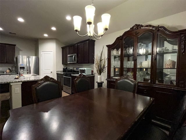 dining room featuring a chandelier