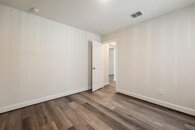 empty room featuring hardwood / wood-style floors