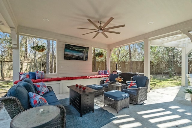 view of patio featuring an outdoor hangout area and ceiling fan